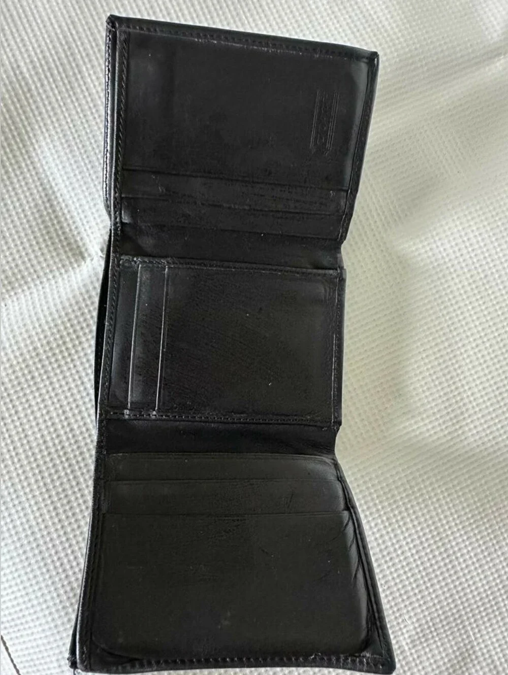 Vintage Black Leather Bifold Wallet Stitched Edge N a Smooth Minimalist Exterior